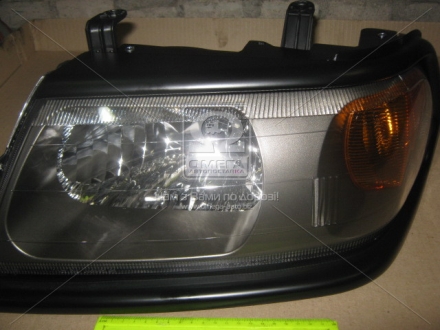 20-B324-A5-6B TYC Фара ліва Mitsubishi Pajero Sport (05-) чорна під коректор (20-B324-A5-6B) TYC